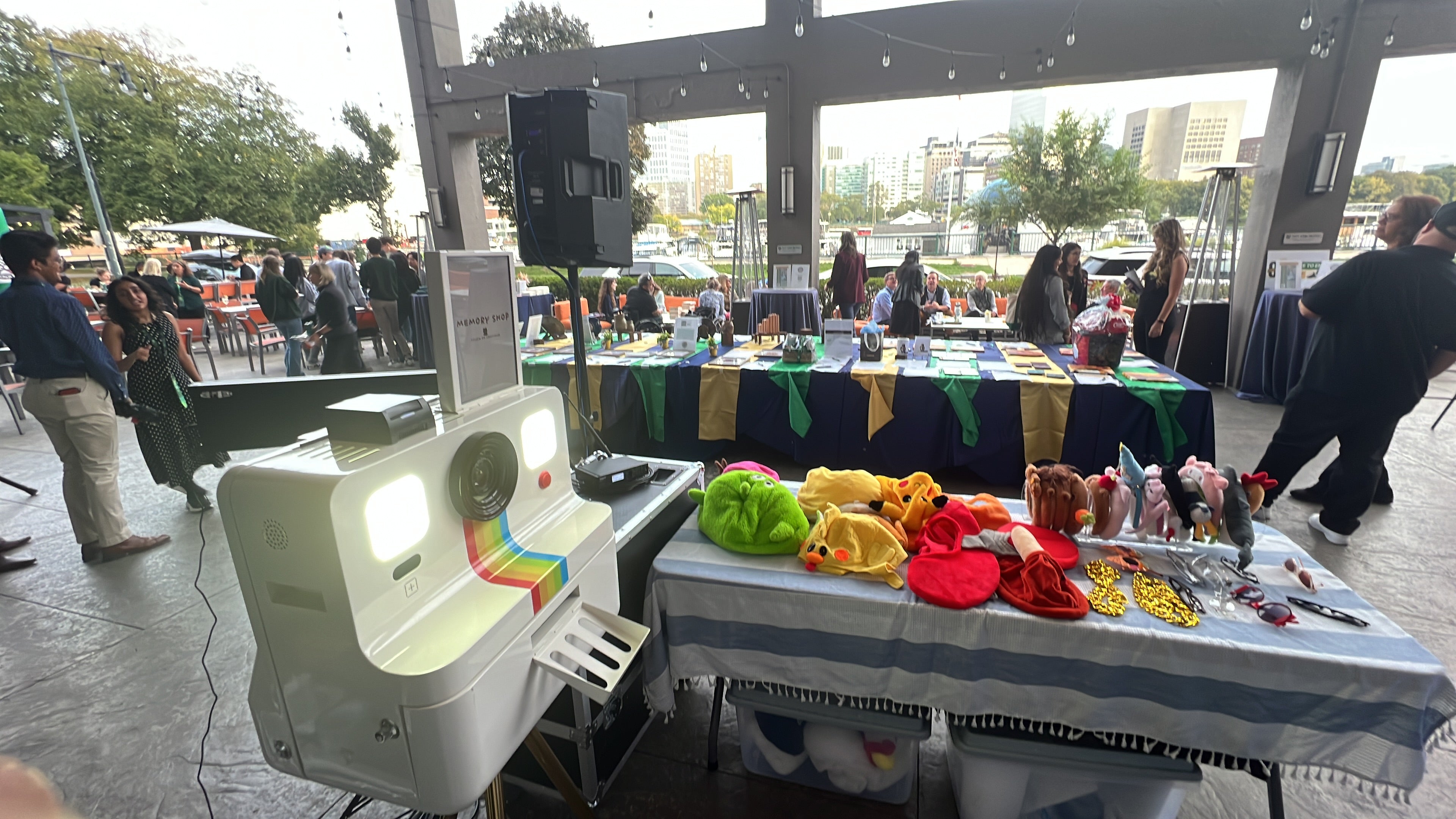 Memory Shop photo booth setup with props and backdrop